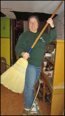 Bonnie Oppenheimer walks tall and carries a big broom?